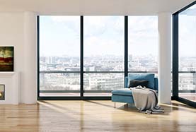 A modern living room featuring large windows, a cozy fireplace, and contemporary furniture arranged for comfort A modern living room featuring large windows, a cozy fireplace, and contemporary furniture arranged for comfort